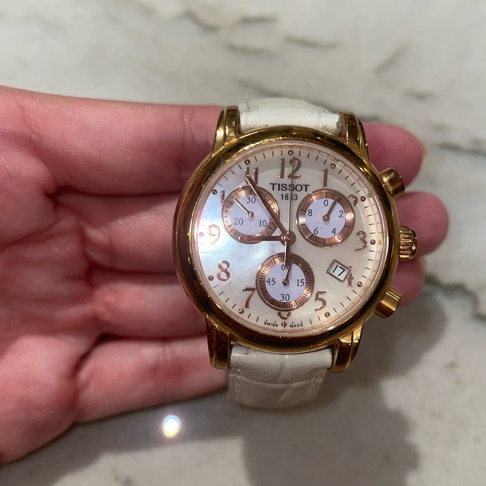 Tissot women’s watch mother of Pearl face white leather band